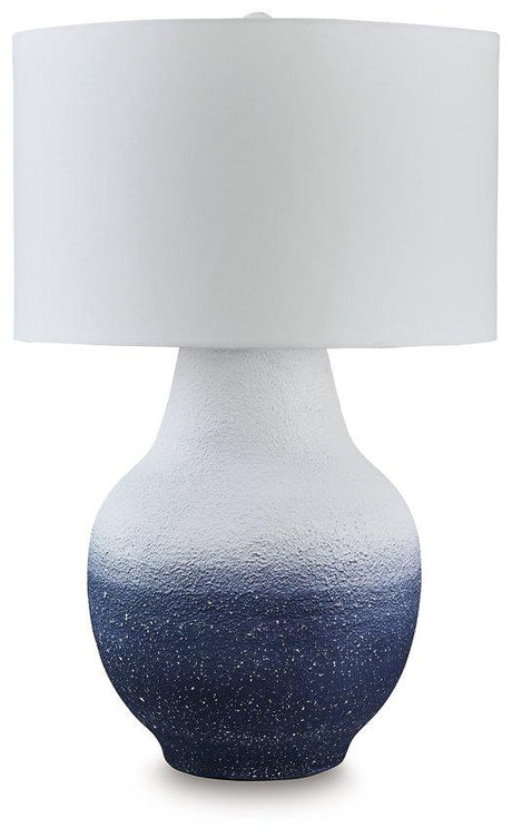 Ashley Furniture Dashland Table Lamp with a modern design, featuring a sleek base and a fabric lampshade for stylish lighting.