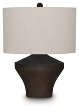 Dolanham table lamp by Ashley Furniture with a classic design, featuring a beige fabric shade and wooden base.