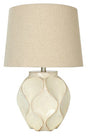 Ashley Furniture Edselham table lamp with a classic design, featuring a sturdy base and a fabric lampshade for stylish lighting.