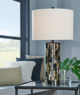 Ellford table lamp by Ashley Furniture with a modern design, featuring a sleek base and a fabric lampshade for stylish lighting.