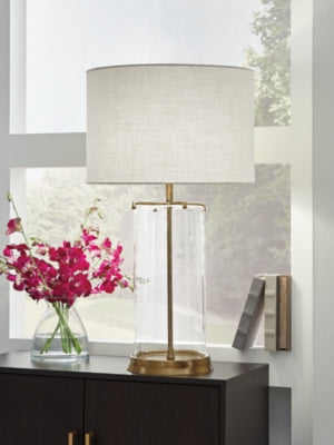 Ashley Furniture Gizeh Table Lamp with a sleek base and fabric shade, perfect for modern living room or bedroom decor.