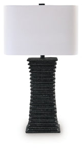 Ashley Furniture Golzar table lamp with a sleek base and fabric shade, ideal for modern home decor.