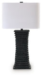 Ashley Furniture Golzar table lamp with a sleek base and fabric shade, ideal for modern home decor.