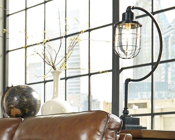 Ashley Furniture Jae Desk Lamp, modern table lamp with sleek design and adjustable arm, ideal for desk or bedside lighting.