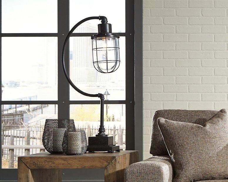 Ashley Furniture Jae Desk Lamp, a modern table lamp with a sleek design and neutral finish, perfect for home office or bedside.