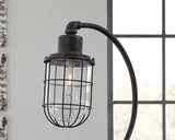 Ashley Furniture Jae Desk Lamp, modern table lamp with sleek design and adjustable arm on a wooden desk.