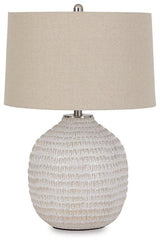 Ashley Furniture Jamon Table Lamp with a modern design, featuring a sleek base and fabric shade, ideal for living room or bedside.