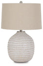 Ashley Furniture Jamon Table Lamp with a modern design, featuring a sleek base and fabric shade, ideal for living room or bedside.
