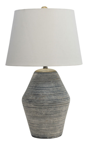 Ashley Furniture Lawrock table lamp with a modern design, featuring a sleek base and a fabric lampshade.