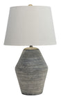 Ashley Furniture Lawrock table lamp with a modern design, featuring a sleek base and a fabric lampshade.