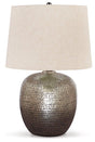 Magalie table lamp by Ashley Furniture featuring a sleek design with a white fabric shade and wooden base.