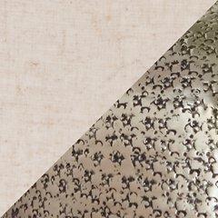 Ashley Furniture Magalie Table Lamp with a sleek base and fabric shade, perfect for living room or bedside lighting.