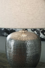 Magalie Ashley Furniture table lamp with a sleek base and fabric shade, ideal for living room or bedside decor.