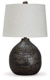 Maire Ashley Furniture table lamp with a sleek ceramic base and fabric shade, perfect for bedside or living room lighting.