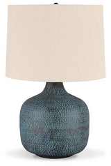 Malthace table lamp with a sleek base and fabric shade, designed by Ashley Furniture for stylish home lighting.