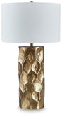 Marshawn table lamp by Ashley Furniture featuring a sleek modern design with a fabric shade on a sturdy base.