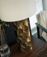 Marshawn Ashley Furniture table lamp with a sleek base and fabric lampshade, ideal for modern living room or bedside decor.