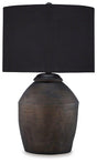Naareman table lamp by Ashley Furniture with a sleek base and fabric shade, ideal for modern living room or bedside lighting.