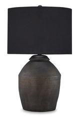 Naareman table lamp by Ashley Furniture featuring a modern design with a sleek base and fabric shade, ideal for bedroom or living room.