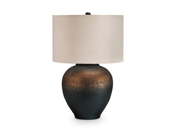 Ashley Furniture Newgerhard table lamp with a sleek design, featuring a white shade and wooden base on a modern side table.