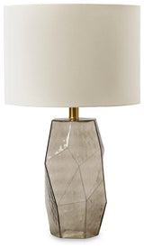 Ashley Furniture Taylow table lamp with a sleek base and fabric shade, perfect for modern living room or bedside decor.