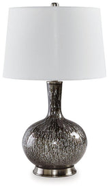 Ashley Furniture Tenslow table lamp with a sleek metal base and fabric shade, placed on a modern wooden side table.