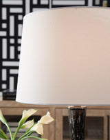 Ashley Tenslow table lamp with a sleek base and fabric lampshade, ideal for modern living room or bedside decor.