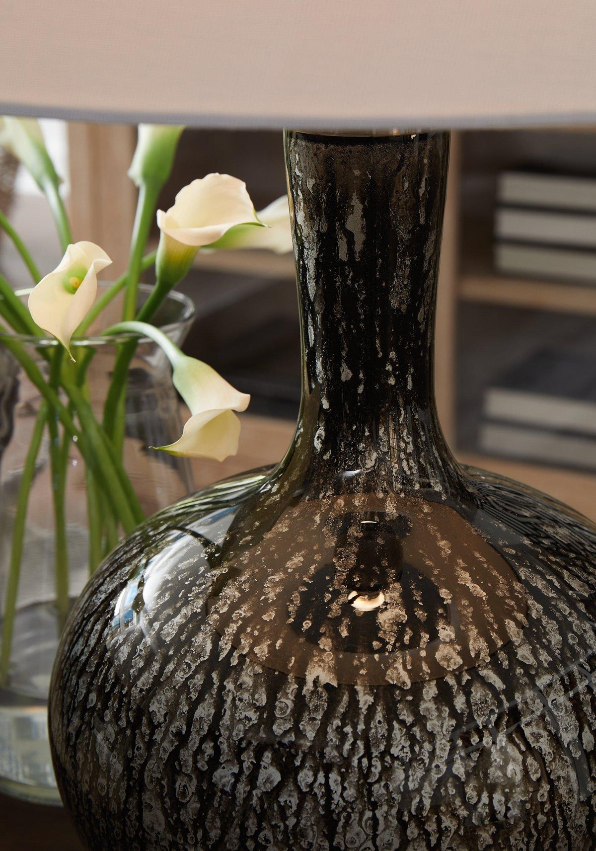 Ashley Furniture Tenslow table lamp with a sleek base and fabric shade, perfect for modern living room or bedside lighting.
