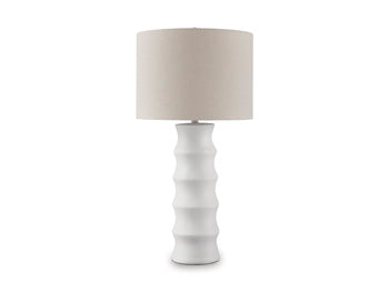 Ashley Furniture Veraleigh table lamp with a beige fabric shade and a sleek ceramic base, perfect for modern home decor.