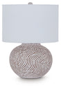 Decorative Ashley Furniture Vien Table Lamp with a sleek base and fabric shade, ideal for adding style to a living space.