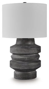 Wahida table lamp by Ashley Furniture featuring a sleek design with a fabric shade and decorative base, ideal for living room or bedroom.