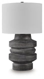 Wahida table lamp by Ashley Furniture featuring a sleek design with a fabric shade and decorative base, ideal for living room or bedroom.