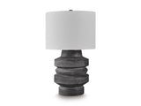 Ashley Furniture Wahida table lamp with a stylish base and fabric shade, perfect for adding ambient lighting to a room
