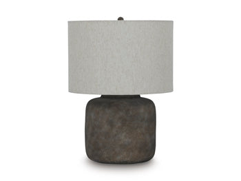 Ashley Furniture Zandophen Table Lamp with beige fabric shade and wooden base on a modern side table.