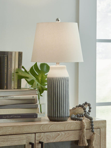 Pair of Ashley Furniture Afener table lamps with beige fabric shades and wooden bases, ideal for bedside or living room decor.