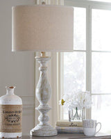Pair of Ashley Furniture Bernadate table lamps with fabric shades and decorative bases, perfect for bedside or living room lighting.