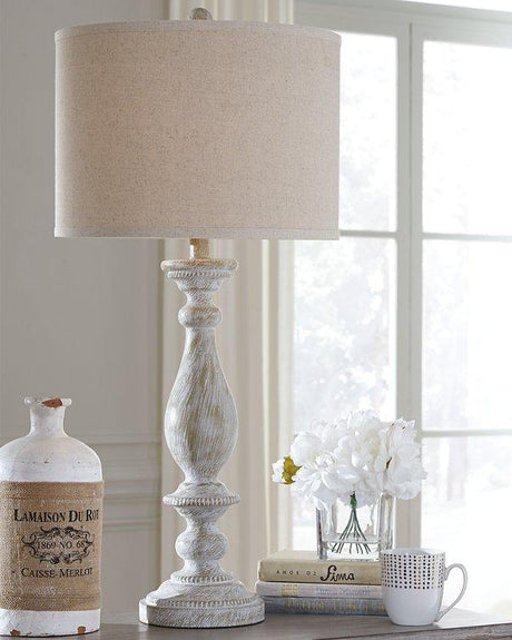 Pair of Ashley Furniture Bernadate table lamps with fabric shades and decorative bases, perfect for bedside or living room lighting.