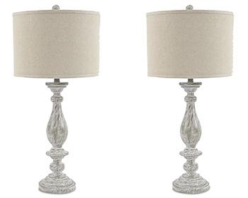 Pair of Ashley Furniture Bernadate table lamps, featuring elegant fabric shades and decorative bases, perfect for bedside or living room.