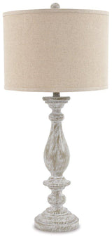 Pair of Ashley Furniture Bernadate table lamps with fabric shades and decorative bases, displayed on a wooden surface.