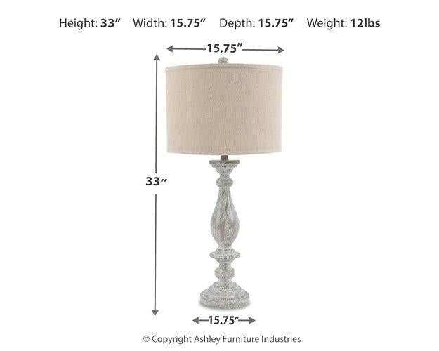 Pair of Ashley Furniture Bernadate table lamps with fabric shades and decorative bases on a wooden surface.