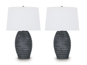 Pair of Caronick table lamps by Ashley Furniture with beige fabric shades and wooden bases, perfect for bedside or living room decor.