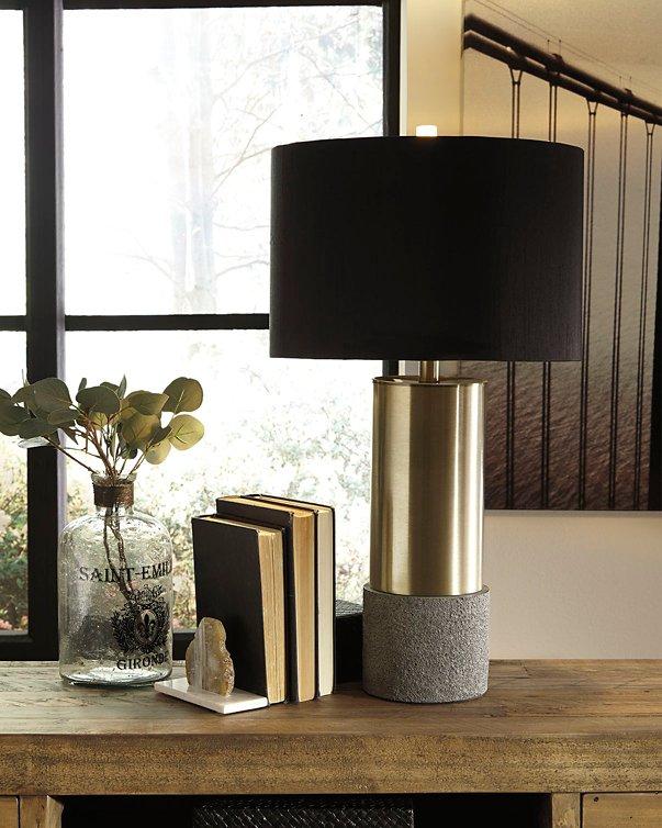 Pair of Jacek table lamps by Ashley Furniture featuring modern design with fabric shades on wooden bases.