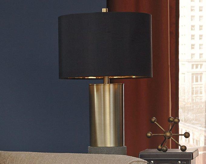 Pair of Ashley Furniture Jacek table lamps with beige fabric shades and dark bronze bases, placed on a wooden surface.