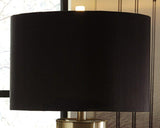Pair of Ashley Furniture Jacek Table Lamps with white shades and sleek bases, perfect for bedside or living room decor.
