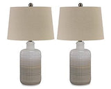 Pair of Ashley Furniture Marnina Table Lamps with beige fabric shades and wooden bases, ideal for bedside or living room decor.