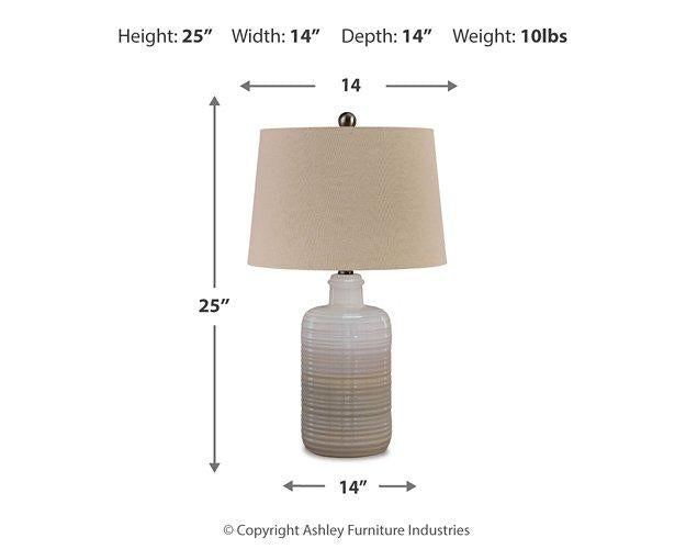 Pair of Ashley Furniture Marnina table lamps with beige fabric shades and decorative bases, perfect for bedside or living room lighting.