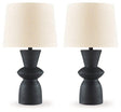 Pair of Ashley Furniture Scarbot table lamps with modern design, featuring sleek bases and fabric shades for stylish lighting.