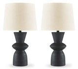 Pair of Ashley Furniture Scarbot table lamps with modern design, featuring sleek bases and fabric lampshades on a bedroom dresser.