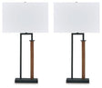 Pair of Ashley Furniture Voslen table lamps with beige fabric shades and dark wood bases, ideal for bedside or living room decor.