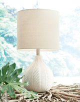 Ashley Furniture Rainermen table lamp set with two stylish lamps featuring neutral shades and modern bases.
